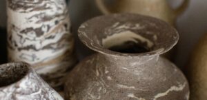 A close up of the marbled ceramic vases in the home studio of Nioka Clay.