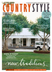 Front cover of Country Style magazine with white renovated country style home.