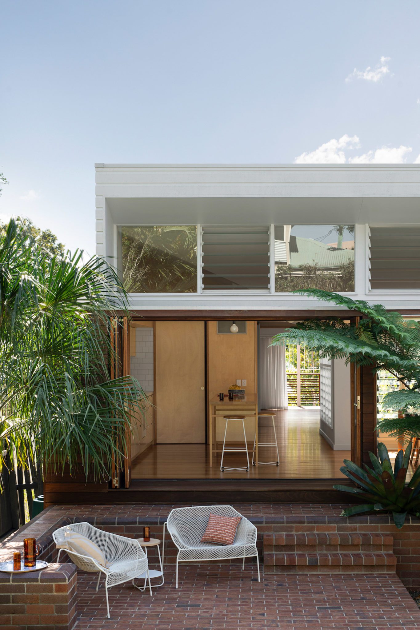 Exterior of brick extension to a Brisbane Queenslander.