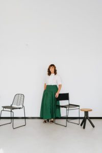 This is a photo from the ebb&flow Design branding shoot that showcases their team and some of their furniture and materials.