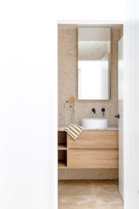Modern bathroom with Baina hand towel and Oaklab vases.