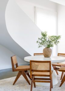 Table with walnut and rattan chairs that was styled for Inside Out Magazine.