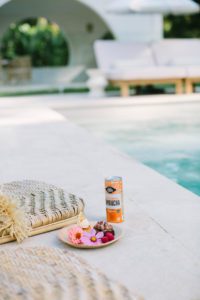 Kombucha and snacks by the pool.