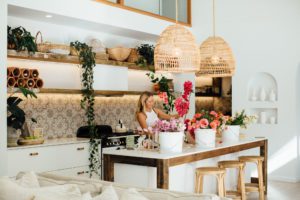 Bask El Sol's kitchen with Aster and Wilde arranging flowers.