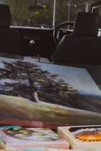 Artwork laid down in the back of a Defender Land Rover.