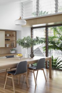 A modern dining room with a Jardan dining table and chairs.