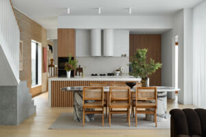 Amado Cottage kitchen with a marble dining table.