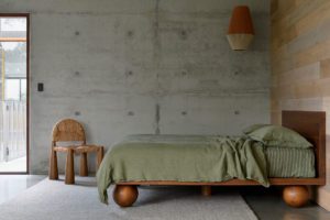 A photo of a Sarah Ellison bed and Rachel Donath chair.