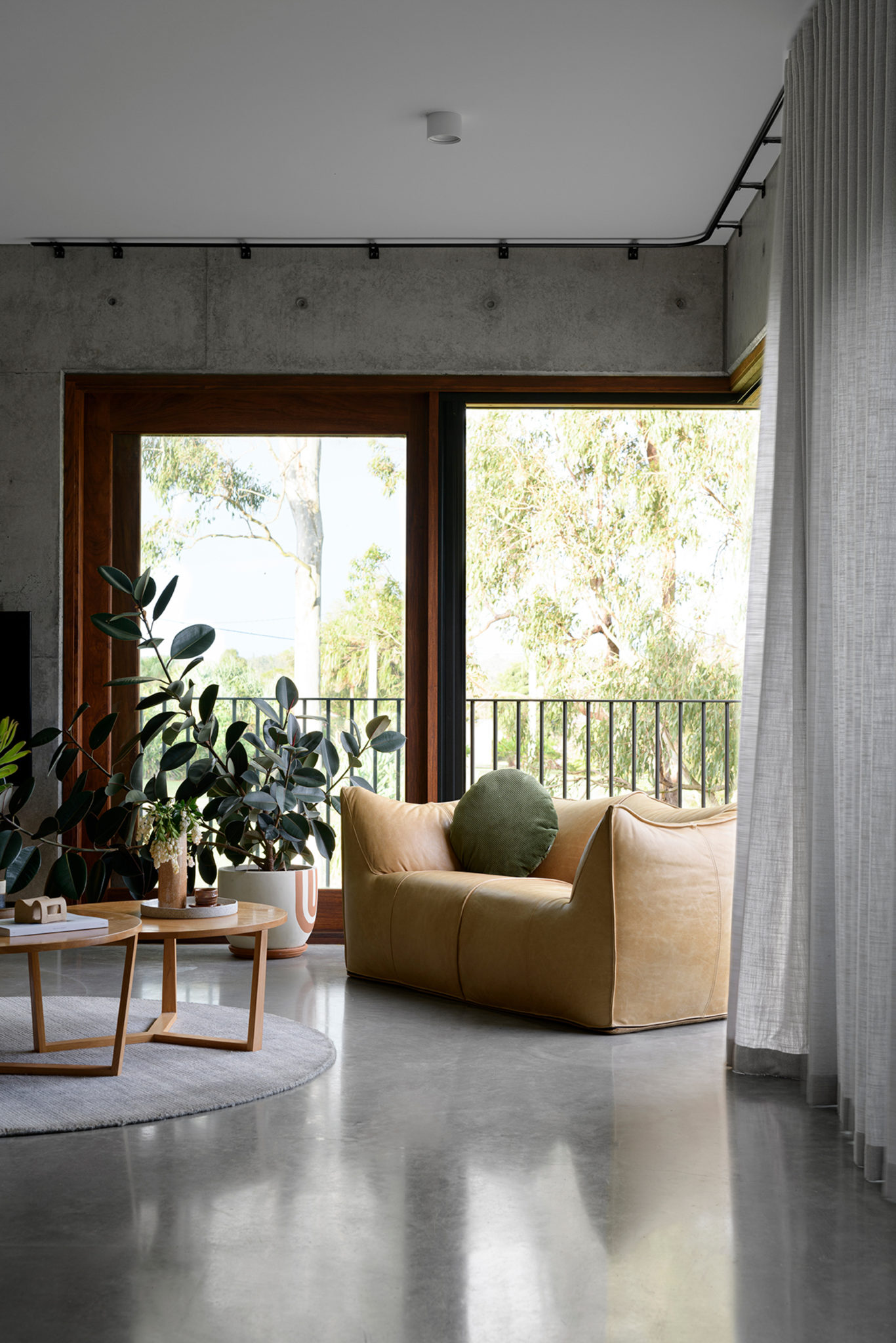 A modern living space with a lounge and coffee table.