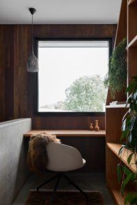A work from home office nook with a view and custom shelf.