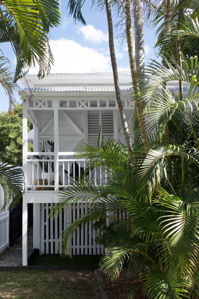 A white Queenslander facade that shows you the verandah that was shot for Inside Out Magazine.