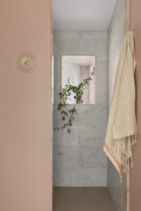 A modern pink bathroom.