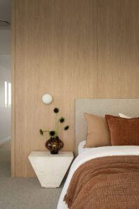 Modern Architectural Bedroom with Oak and Rust Colours.