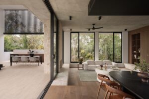 View from the dining area down to the sunken lounge and outdoor area.