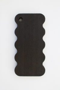 A grazing board with curved and wavy edges.