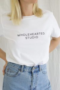 A t-shirt with Wholehearted Studio printed on it.