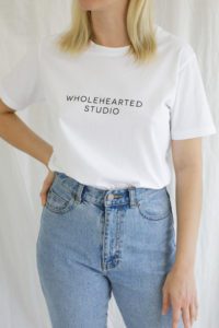 A t-shirt with Wholehearted Studio printed on it.