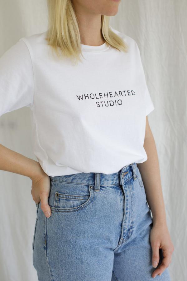 A t-shirt with Wholehearted Studio printed on it.