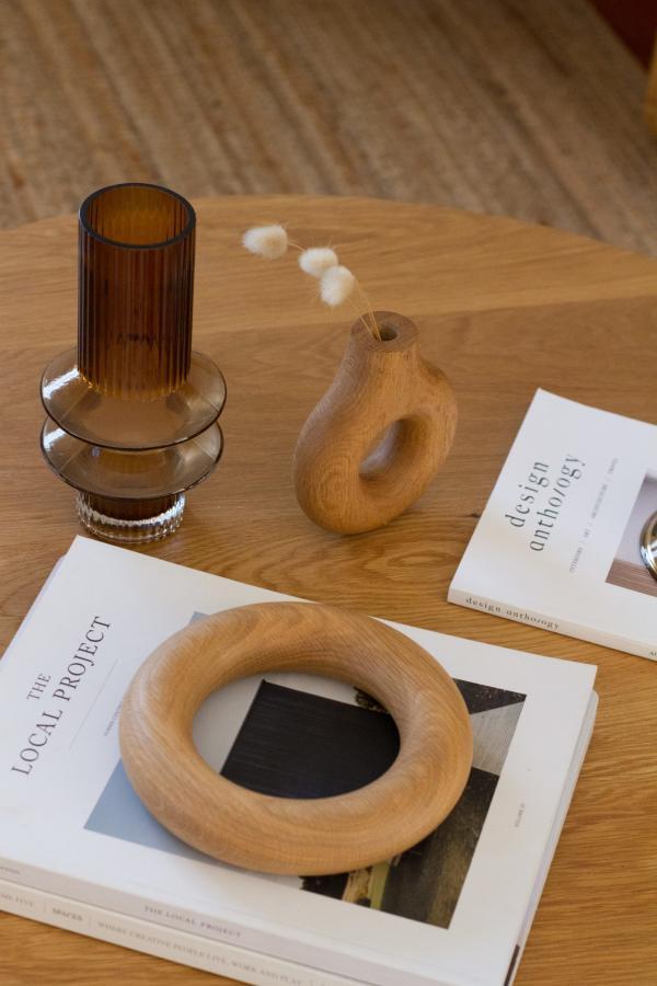 A round doughnut shaped object for styling coffee tables.