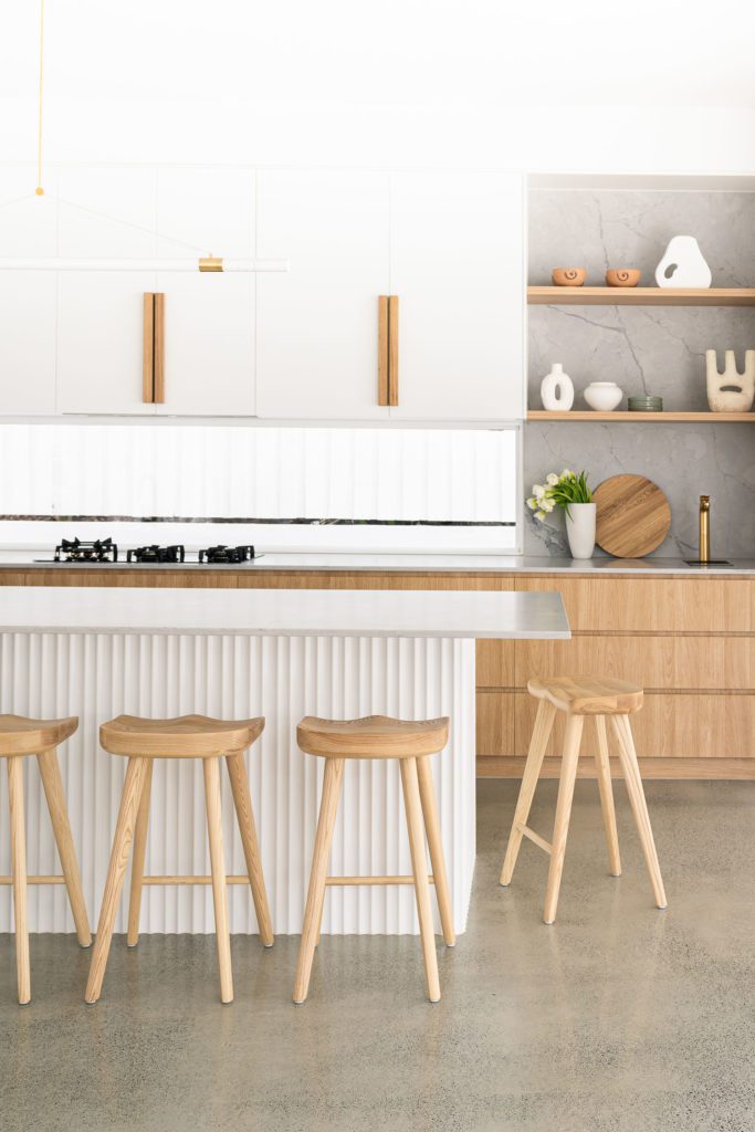 Kitchen shelf styling in a modern home.